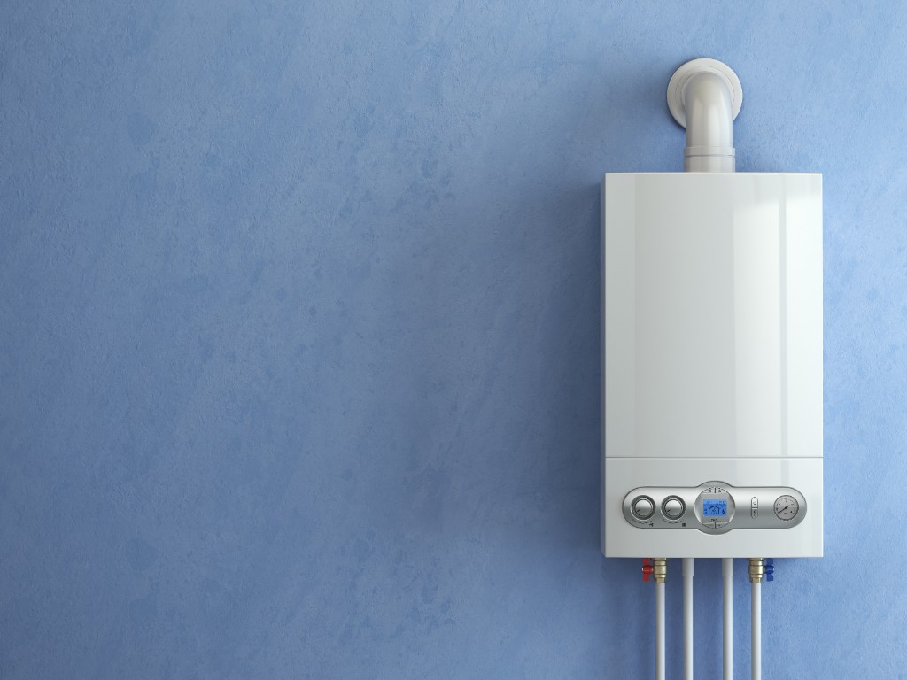 Tankless water heater installation with supply piping